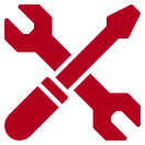 Red wrench and screwdriver crossed icon.